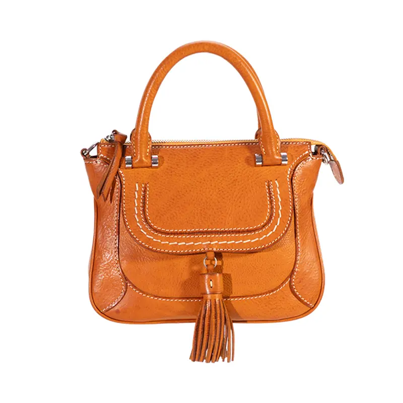 ဟင်းသီးဟင်းရွက်- Tanned Leather Tassel Bag